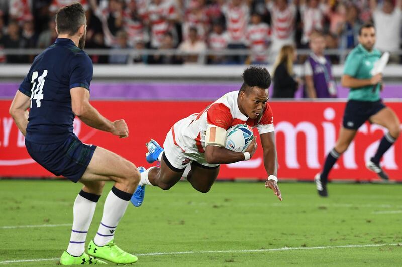 Japan wing Kotaro Matsushima scores his team's first try against Scotland. AFP