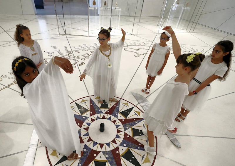Abu Dhabi, United Arab Emirates - December 04, 2019: Repton School, Abu Dhabi. The Young Guides programme sees school children from across the UAE take part in a 6-week long programme to learn about a select group of objects from the museumÕs permanent collection and receive special training from Louvre AbuDhabiÕs Education team, who teach them how to present and educate a museum-going audience about artistic objects. Wednesday, December 4th, 2019. Louvre, Abu Dhabi. Chris Whiteoak / The National