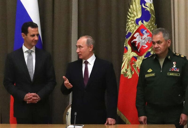 Assad told the Russian leader: "At this stage, especially after we achieved victory over terrorists, it is in our interests to move forward with the political process." Mikhail Klimentyev / EPA