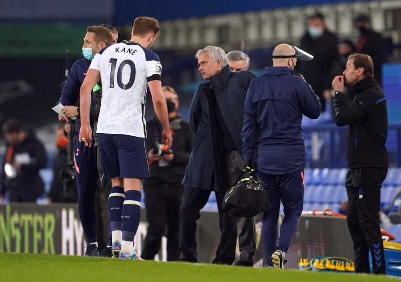 Soccer Football - Premier League - Everton v Tottenham Hotspur - Goodison Park, Liverpool, Britain - April 16, 2021 Tottenham Hotspur's Harry Kane with manager Jose Mourinho as he walks off the pitch after sustaining an injury Pool via REUTERS/Jon Super EDITORIAL USE ONLY. No use with unauthorized audio, video, data, fixture lists, club/league logos or 'live' services. Online in-match use limited to 75 images, no video emulation. No use in betting, games or single club /league/player publications.  Please contact your account representative for further details.