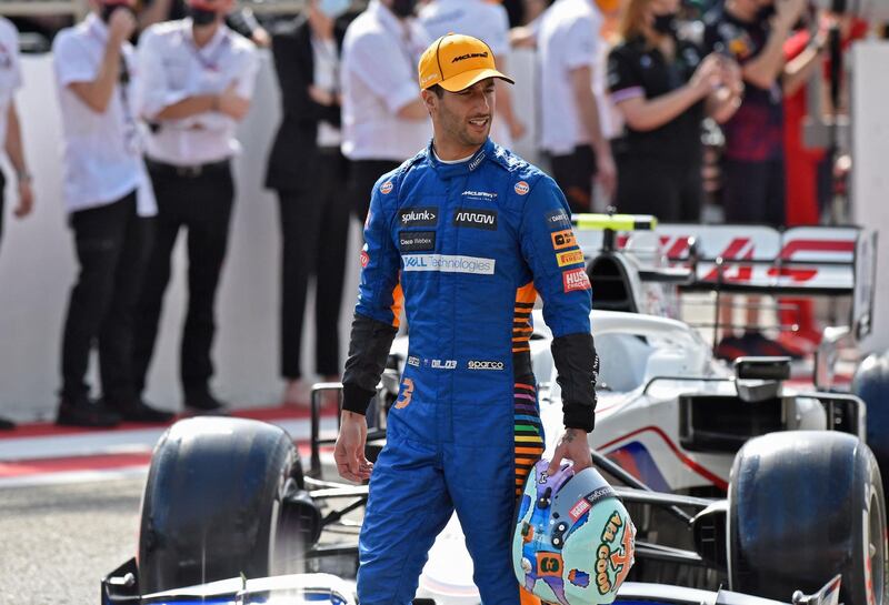 McLaren's Australian driver Daniel Ricciardo is pictured on the track ahead of the first day of the Formula One (F1) pre-season testing at the Bahrain International Circuit in the city of Sakhir on March 12, 2021. / AFP / Mazen MAHDI
