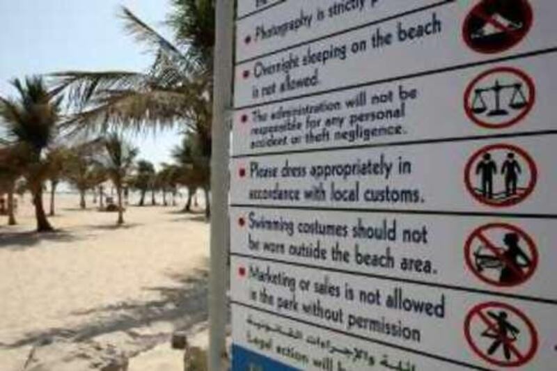 DUBAI, UNITED ARAB EMIRATES- Sep 4:  New Beach Instructions Sign Board put up by Dubai Municipality at Jumeirah open beach in Dubai. ( Pawan Singh / The National )
Story by Salam *** Local Caption ***  PS001- BEACH SIGNS.jpg
