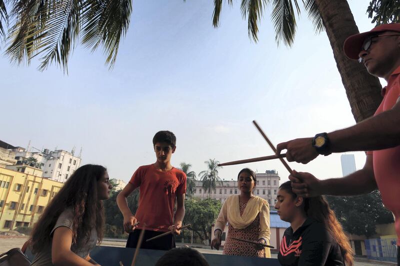 The students take drumming classes. Courtesy Jenny Gustafsson