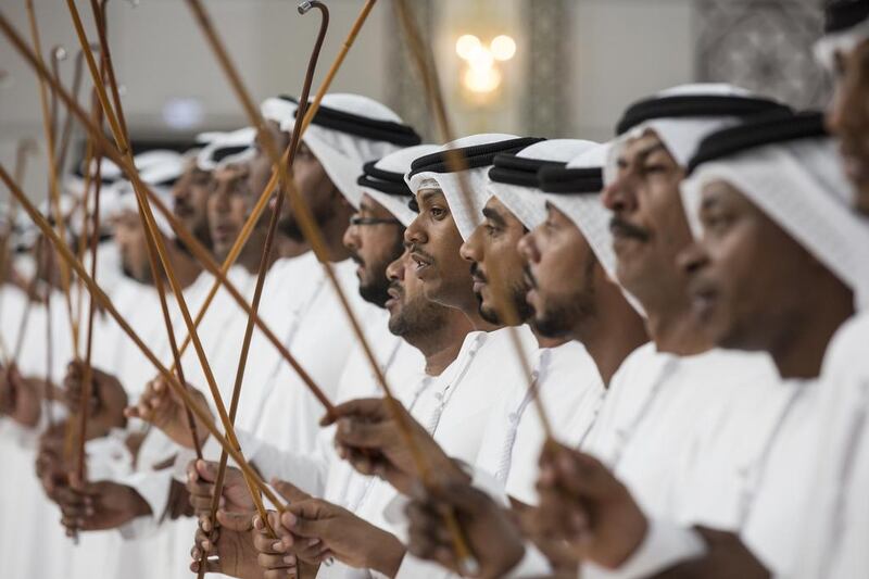 Men sing during a group wedding for Dr Sheikh Khaled bin Sultan bin Zayed (not shown), and other grooms at Mushrif Palace. Ryan Carter / Crown Prince Court - Abu Dhabi