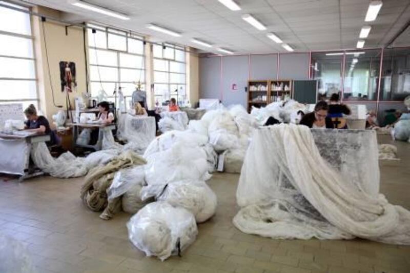 CAUDRY,FRANCE. 23/5/11. Bundles of lace are checked and hand finished at the Sophie Hallette lace making factory in Caudry, Northern France. Stephen Lock  for  The National. FOR ARTS & LIFE