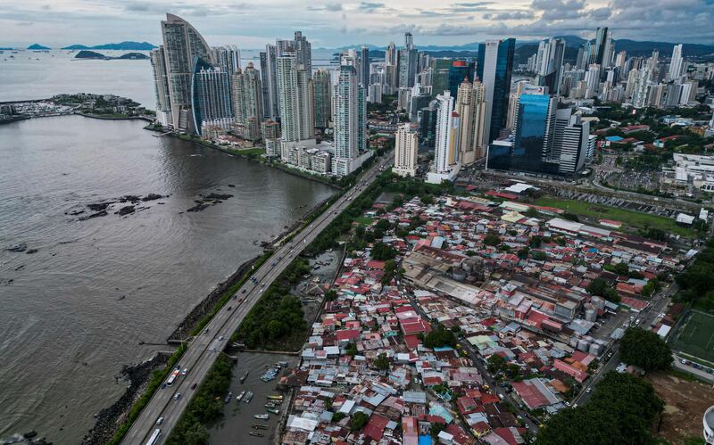 The shanty town of Boca la Caja, which was once was a settlement for fishermen and their families, is wedged between luxury apartment towers in Panama City. AFP