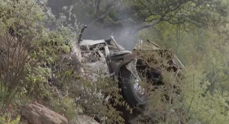 The bus fell about 50 metres from the mountain pass, about 300km north of Johannesburg. AP