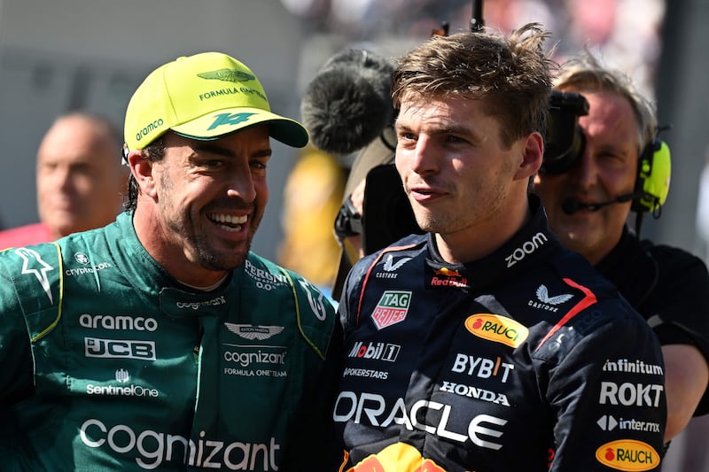 Pole position winner Red Bull's Max Verstappen with second-placed Aston Martin's Fernando Alonso. AFP