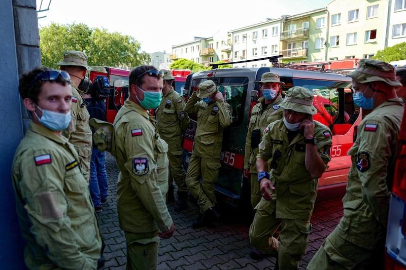 Polish Search and Rescue Firefighters prepare to leave with aid to Beirut, in Warsaw, Poland.  EPA