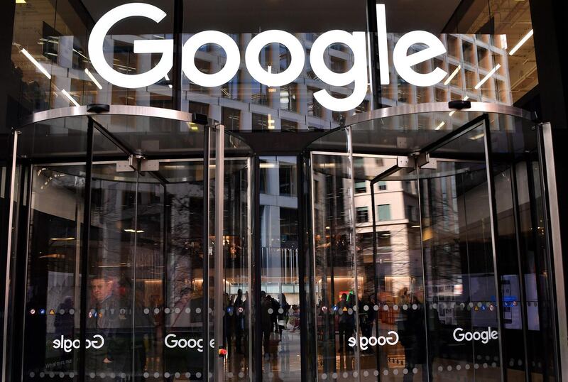 (FILES) In this file photo taken on January 18, 2019 a logo is pictured above the entrance to the offices of Google in London. Google on June 16, 2020 confirmed that it booted one far-right website from its ad platform and put another on notice for hosting "dangerous and derogatory" comments about civil rights protests. / AFP / Ben STANSALL
