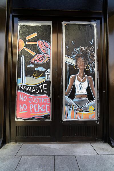 A mural painted in support of Black Lives Matter on the doors of an office building on 16th Street in Washington DC. Sophie Tremblay for The National