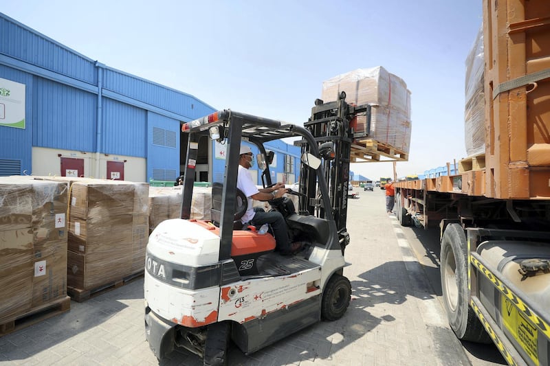 Dubai, United Arab Emirates - Reporter: Kelly Clarke. Aid is loaded onto a truck by the International Federation of Red Cross and Red Crescent Societies to support Beirut. Wednesday, August 5th, 2020. Dubai. Chris Whiteoak / The National