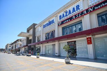 Closed shops in the Lara district in Antalya last month, which is usually busy with tourists. Tourism generates about 11 per cent of Turkey's GDP, but the industry has been hit by a lack of travellers as a result of the Covid-19 pandemic. AFP