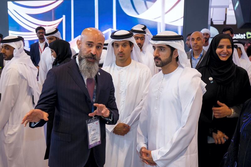 Sheikh Hamdan bin Mohammed, Crown Prince of Dubai, visits the Cisco stand at Gitex Technology Week, where he was shown around by Shukri Eid, the managing director of Cisco. Courtesy Cisco Middle East Twitter