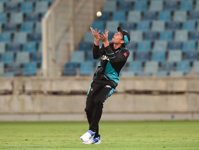 New Zealand's Mitchell Santner catches UAE batter Asif Khan for 13.