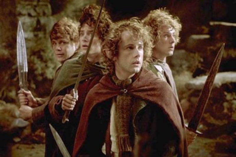 Sean Astin, left, Elijah Wood, Billy Boyd, centre, and Dominic Monaghan, right, appearing in "The Lord of the Rings".