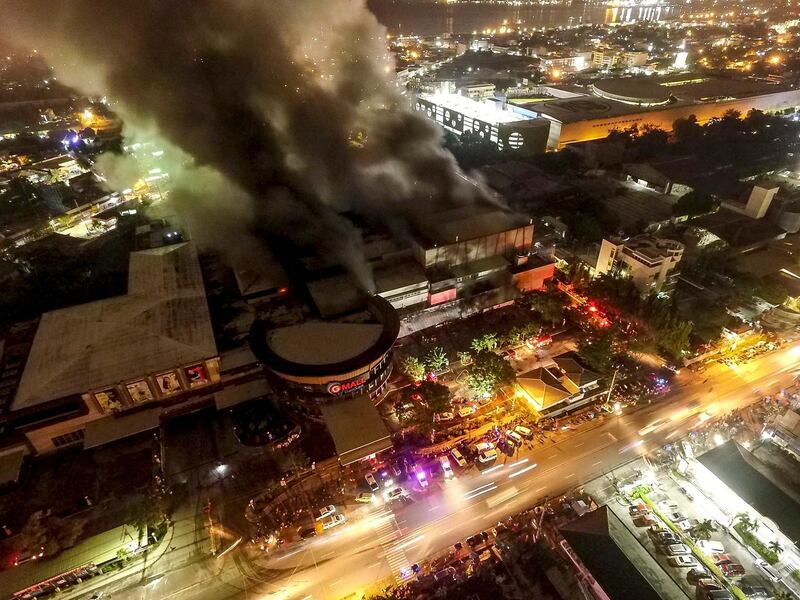 epa07925707 A drone photo of a burning mall ignited caused by a Magnitude 6.4 earthquake in General Santos city, Philippines, 16 October 2019. According to local reports, several people are injured after the magnitude 6.4 earthquake struck southern Philippines.  EPA/AJ RESANE