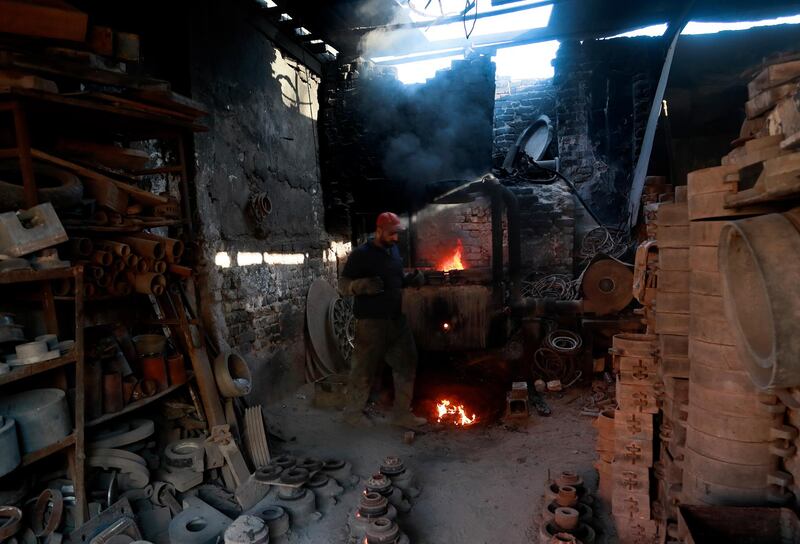 Ammar Adel works at a metal recycling workshop in Baghdad, Iraq. Adel earns about 20 US dollars per day.  AO
