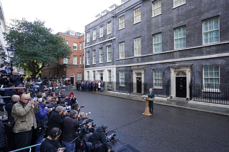 Journalists pack into Downing Street as Ms Truss makes her statement. PA