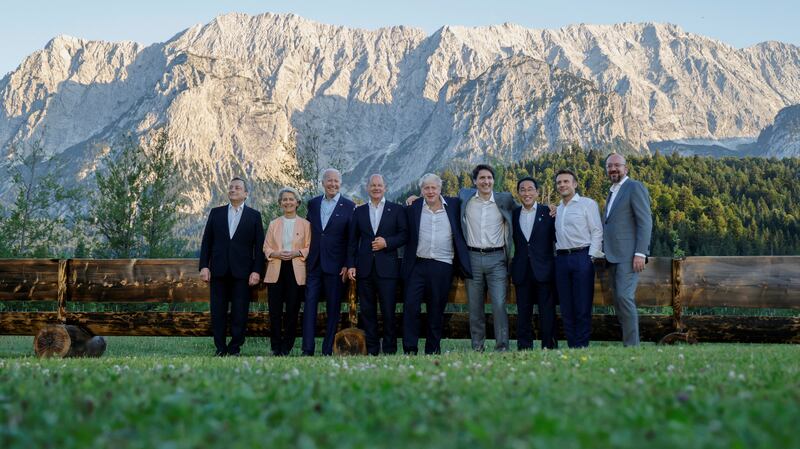 Left to right: Italian Prime Minister Mario Draghi, President of the European Commission Ursula von der Leyen, US President Joe Biden, German Chancellor Olaf Scholz, British Prime Minister Boris Johnson, Canadian Prime Minister Justin Trudeau, Japanese Prime Minister Fumio Kishida, French President Emmanuel Macron and President of the European Council Charles Michel pose for a photo after a working dinner during the G7 Summit at Elmau Castle in Germany, June 26. Reuters