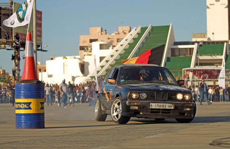 A driver competes during a drift racing in the eastern Libyan port city of Benghazi.   AFP