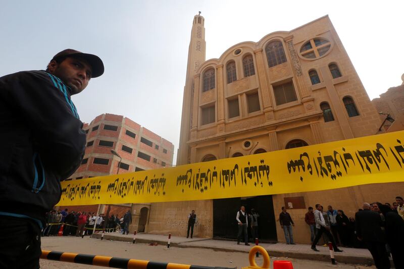 Police tape cordon is seen at the site of attack on a church in the Helwan district south of Cairo. Amr Abdallah Dalsh / Reuters