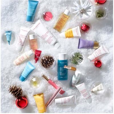 Open the doors to a collection of miniature Clarins classic and seasonal favourite products. Photo: Clarins