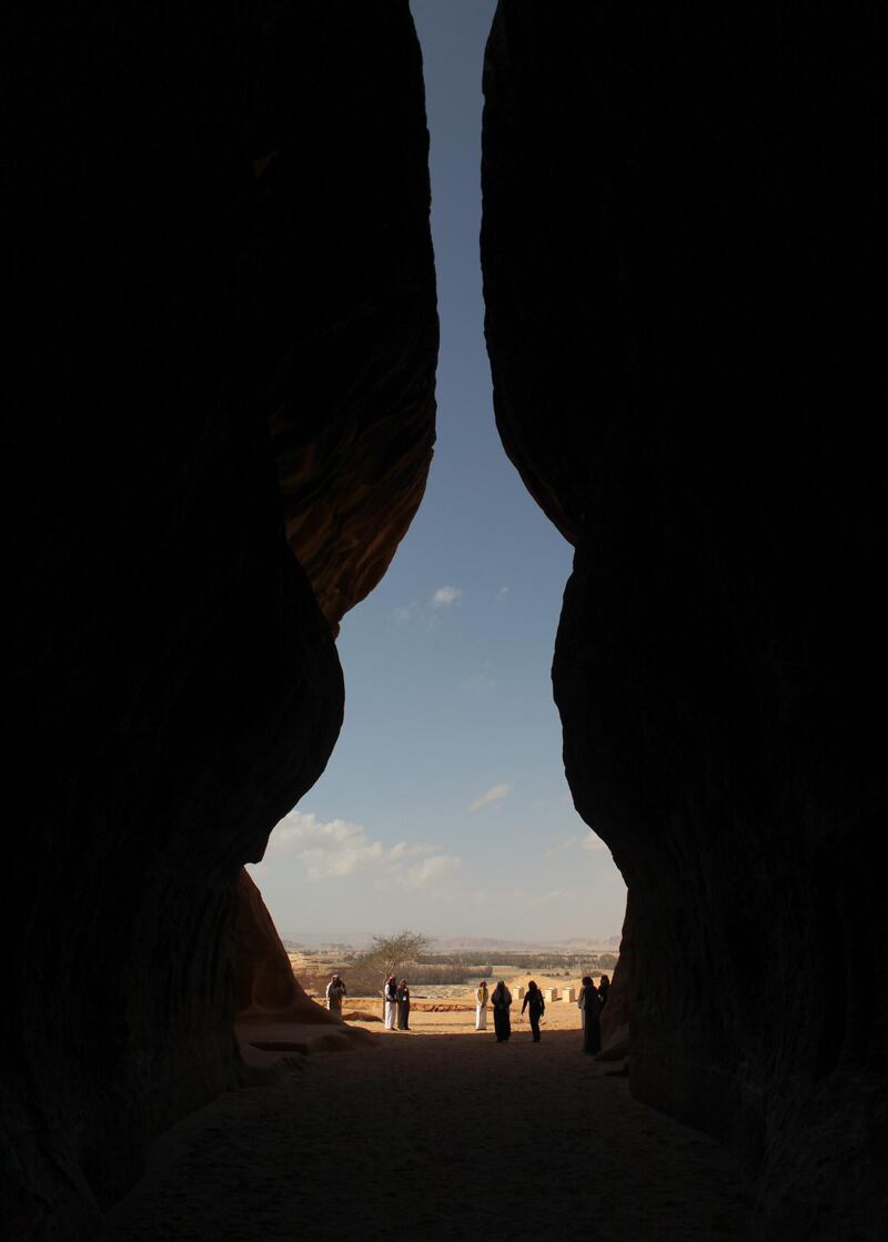 Visitors tour the ancient heritage site of excavated rock at Al Ula, Saudi Arabia. Saudi Arabia's Crown Prince Mohammed Bin Salman officially launched his vision of the mega tourism project at the ancient site of Al Ula. Bloomberg