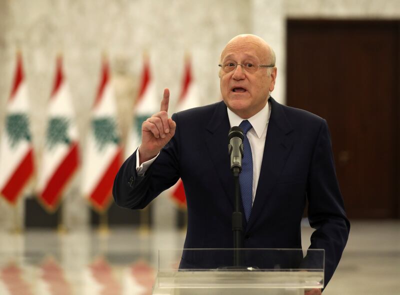 Lebanon's Prime Minister Najib Mikati gestures as he speaks to the press after meeting President Michel Aoun at the presidential palace in Baabda. Reuters