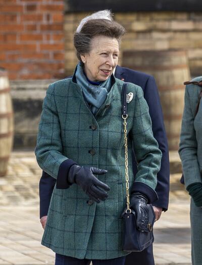 Princess Anne (centre) during the official re-opening of HMS Caroline and the Pumphouse at Alexandra Dock, Belfast Harbour.