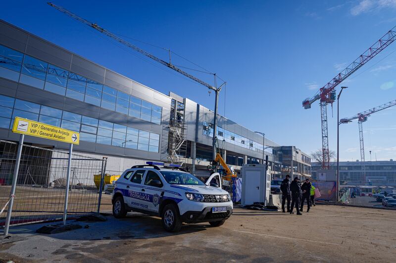 Border police officers outside the VIP terminal at the Nikola Tesla airport in Belgrade, Serbia. AP