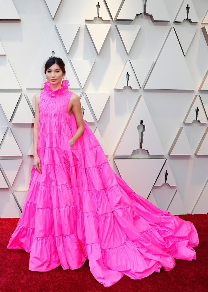 epa07394469 Gemma Chan arrives for the 91st annual Academy Awards ceremony at the Dolby Theatre in Hollywood, California, USA, 24 February 2019. Pink dress by Valentino. The Oscars are presented for outstanding individual or collective efforts in 24 categories in filmmaking.  EPA-EFE/ETIENNE LAURENT