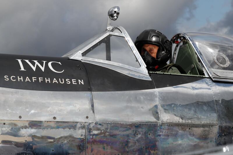 British aviator Steve Brooks sits in the cockpit of a restored World War II Silver Spitfire plane ahead of take off on a round-the-world flight attempt at Goodwood Aerodrome. The restored plane fought in World War II but has been de-militarised, stripped of its guns and paintwork to reveal the shining, silvery metal underneath. Adrian Dennis / AFP