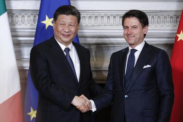  Italian prime minister Giuseppe Conte shakes hands with the Chinese president Xi Jinping during a recent meeting in Rome. EPA