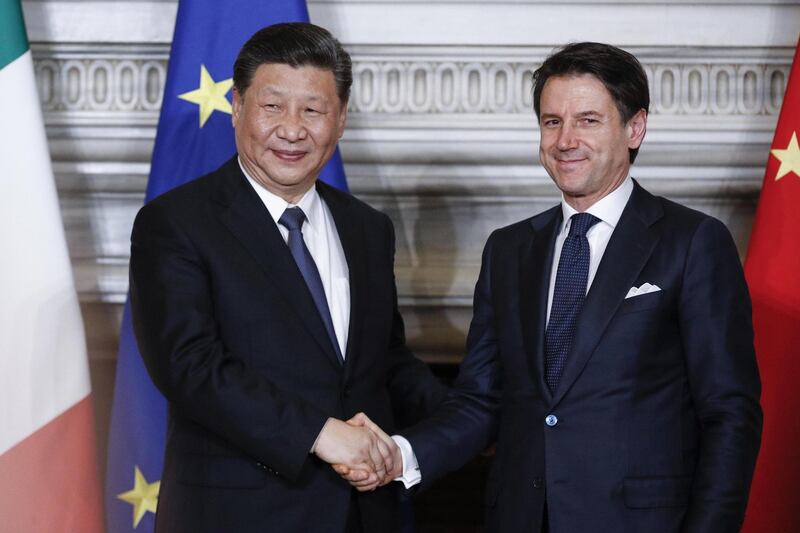 epaselect epa07458227 Italian premier Giuseppe Conte (R) shakes hands with Chinese President Xi Jinping during their meeting at the Villa Madama in Rome, Italy, 23 March 2019. President Xi Jinping is in Italy to sign a memorandum of understanding to make Italy the first Group of Seven leading democracies to join China's ambitious Belt and Road infrastructure project.  EPA/GIUSEPPE LAMI