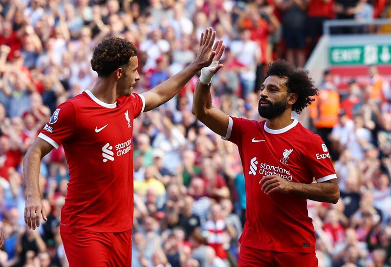  Liverpool's Mohamed Salah celebrates with Curtis Jones after scoring. Reuters
