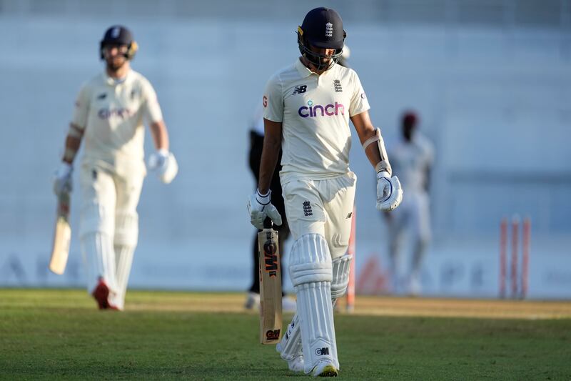 Saqib Mahmood leaves the pitch after being bowled by Jermaine Blackwood to end the day one action. AP