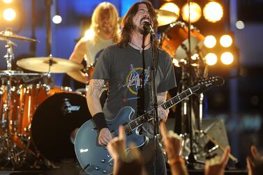 LOS ANGELES, CA - FEBRUARY 12: Musician Dave Grohl of the Foo Fighters performs onstage at the 54th Annual GRAMMY Awards held at Staples Center on February 12, 2012 in Los Angeles, California.   Jason Merritt/Getty Images/AFP (Photo by Jason Merritt / GETTY IMAGES NORTH AMERICA / Getty Images via AFP)