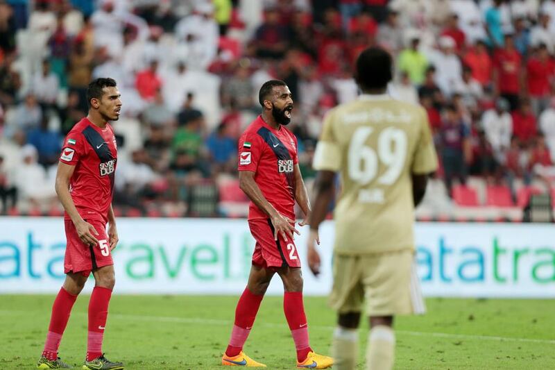 Al Ahli’s Salmeen Khamis (2) celebrates scoring against Al Shaab during their Arabian Gulf League match, the final one of the season, at Rashid Stadium in Dubai on May 8, 2016. Christopher Pike / The National