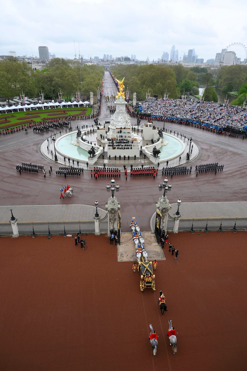 King Charles and Queen Camilla leave Buckingham Palace in the Diamond Jubilee Carriage. Getty
