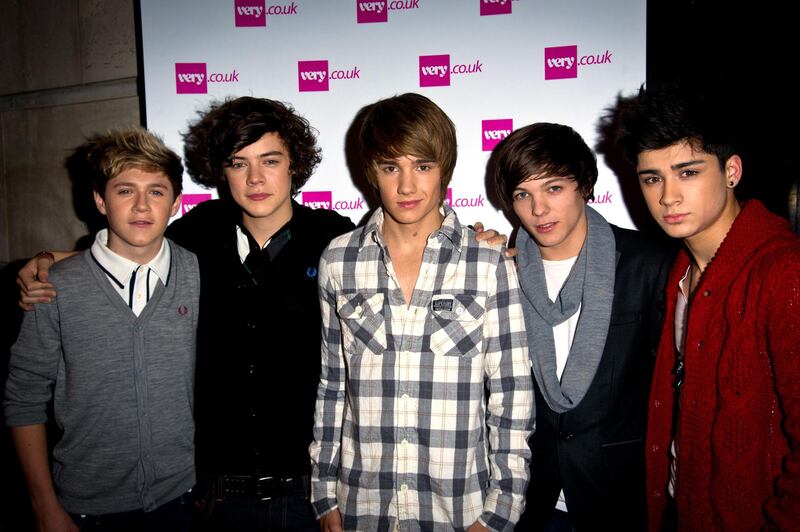LONDON, ENGLAND - NOVEMBER 24:  (L-R) Niall Horan, Harry Styles, Liam Payne, Zain Malik and Louis Tomlinson of 'One Direction' attends the Very.co.uk Christmas Catwalk Show at Victoria House on November 24, 2010 in London, England.  (Photo by Ian Gavan/Getty Images)