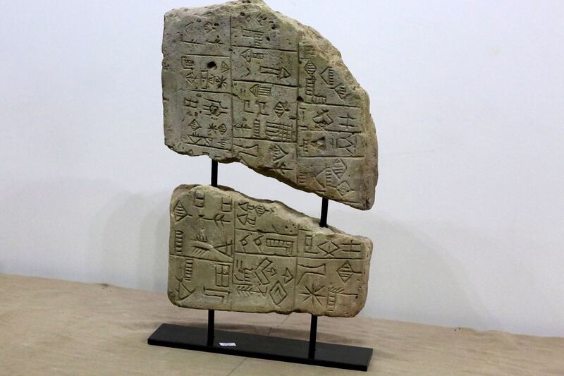 A tablet on display at the Iraqi National Museum after it was returned by Lebanon. AFP