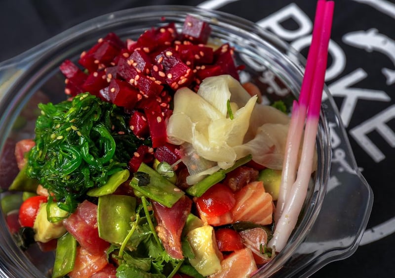 Poke Poke Dubai, UAE’s first poke restaurant, offers the option to customise bowls with fresh ingredients. Victor Besa for The National 