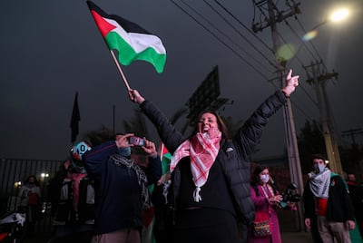 Members of the Palestine community in Chile take part in a demonstration to protest against Israel and in support of Palestinians, in Santiago, Chile, Tuesday, May 18, 2021. (AP Photo/Esteban Felix)