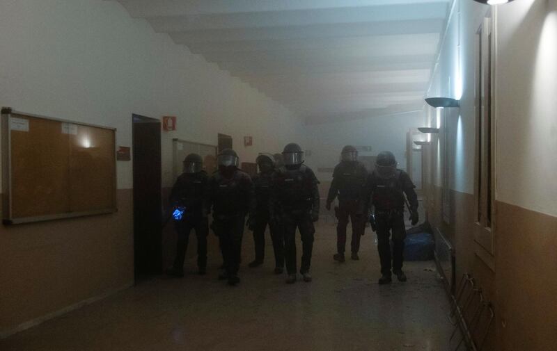Riot police arrive inside the University of Lleida. Reuters