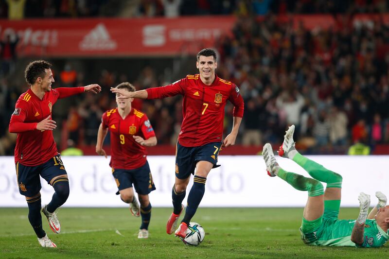 Spain's Alvaro Morata, centre, celebrates. AP Photo