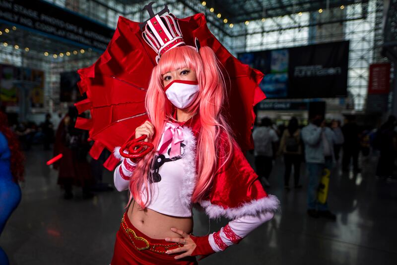 A costumed attendee poses during New York Comic Con. Charles Sykes / Invision / AP