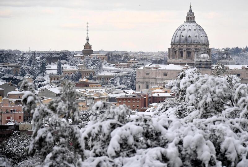 A view of a snow-capped St Peter's Dome after a snowfall in Rome, Italy. Ettore Ferrari / EPA