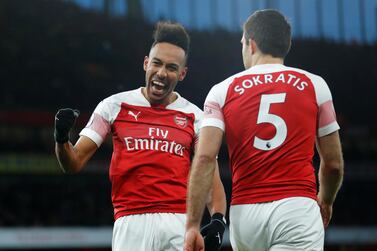 Pierre-Emerick Aubameyang celebrates scoring their Arsenal's second goal against Manchester United with Sokratis Papastathopoulos. Reuters
