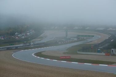 Overcast weather delays the start of the first practice session for the Eifel Formula One Grand Prix at the Nuerburgring racetrack in Nuerburg, Germany, Friday, Oct. 9, 2020. The Germany F1 Grand Prix will be held on Sunday. (Ronald Wittek, Pool via AP)